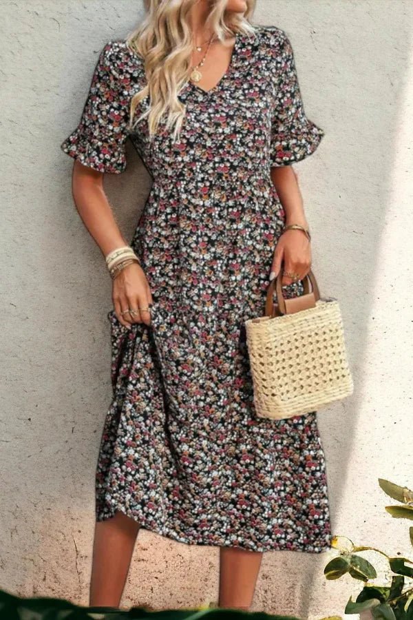 Robe d'été femme à imprimé floral, silhouette mi-longue et style chic. 6