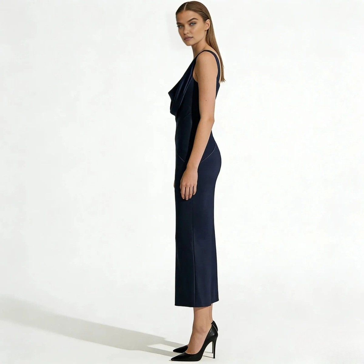 Elegant backless dress with a sculpted silhouette for evening occasions. 6