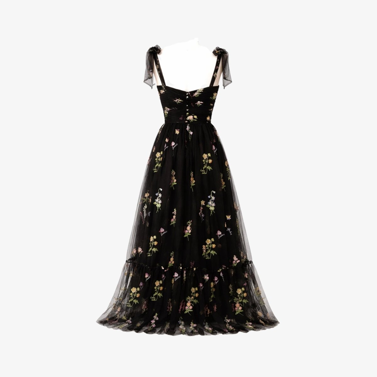 Robe évasée avec des détails floraux brodés. 4