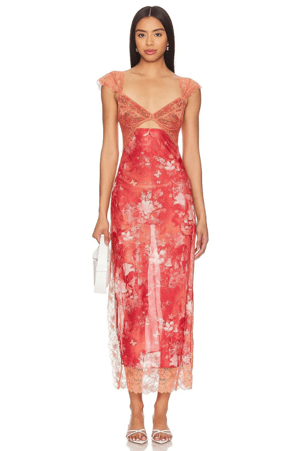 Robe fourreau avec imprimés floraux et détails en dentelle élégante. 12