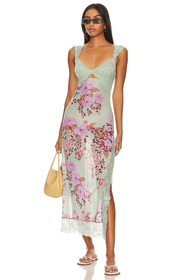 Robe fourreau avec imprimés floraux et détails en dentelle élégante. 14