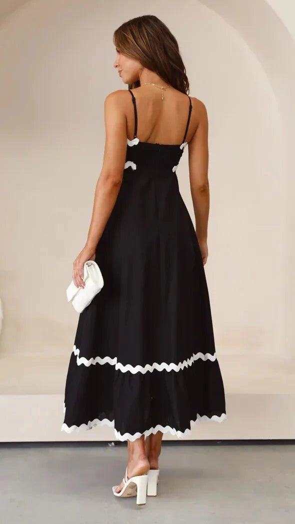 Robe longue élégante à bretelles réglables et silhouette fluide. 2
