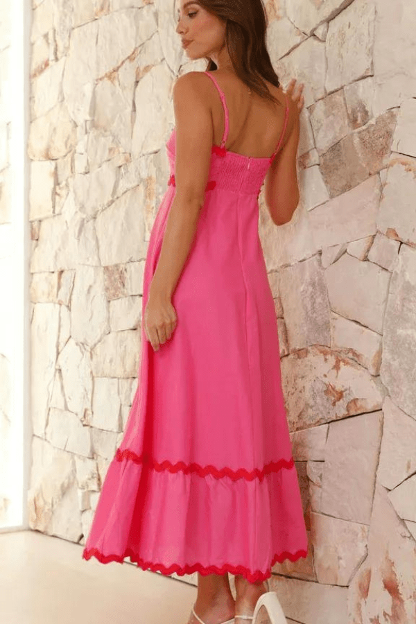 Robe longue élégante à bretelles réglables et silhouette fluide. 6