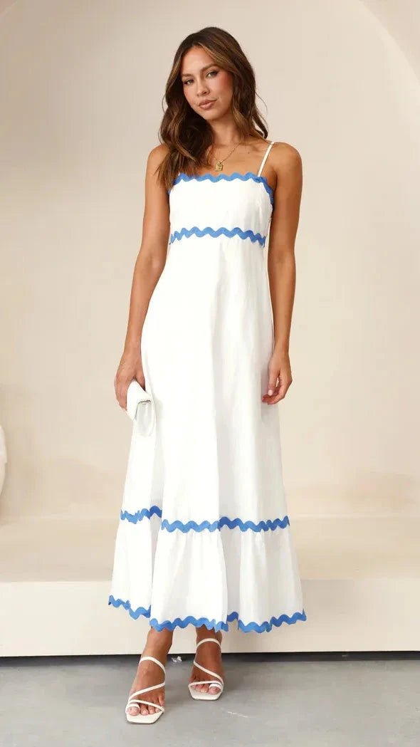 Robe longue élégante à bretelles réglables et silhouette fluide. 7
