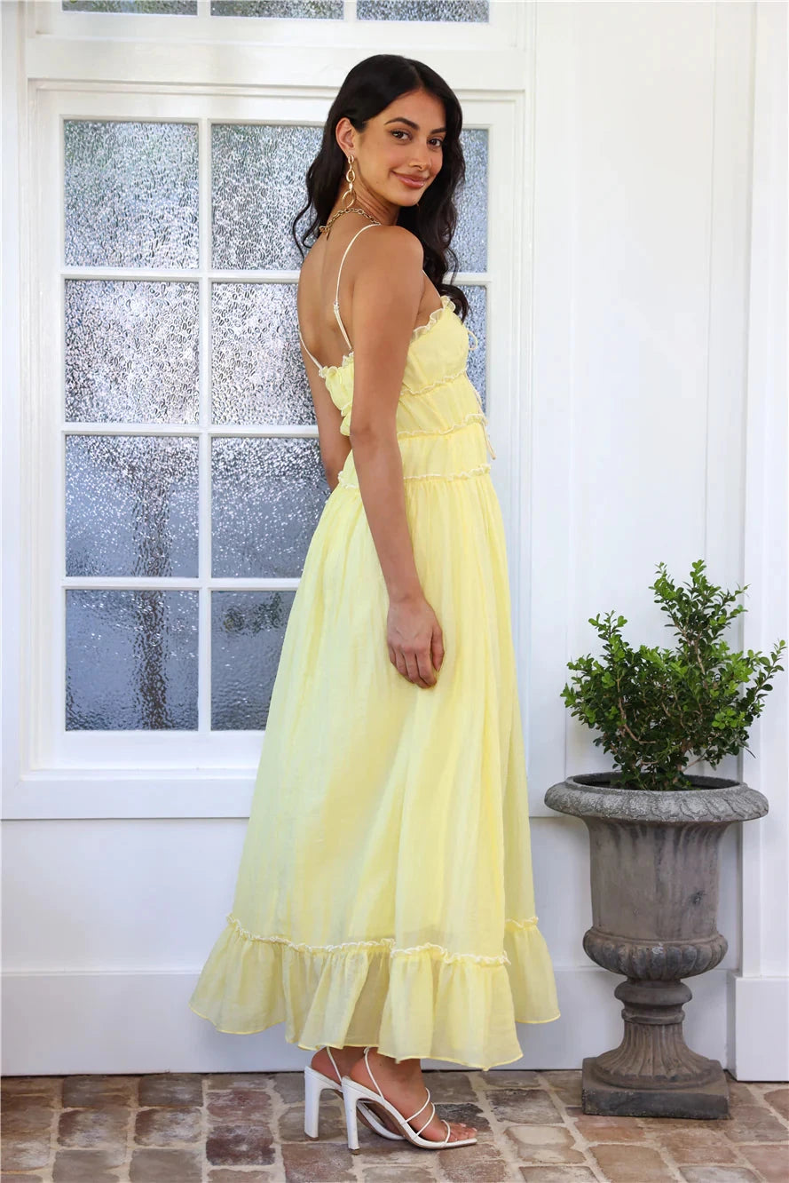 Robe longue élégante à jupes fluides et volants, idéale pour les soirées. - 4