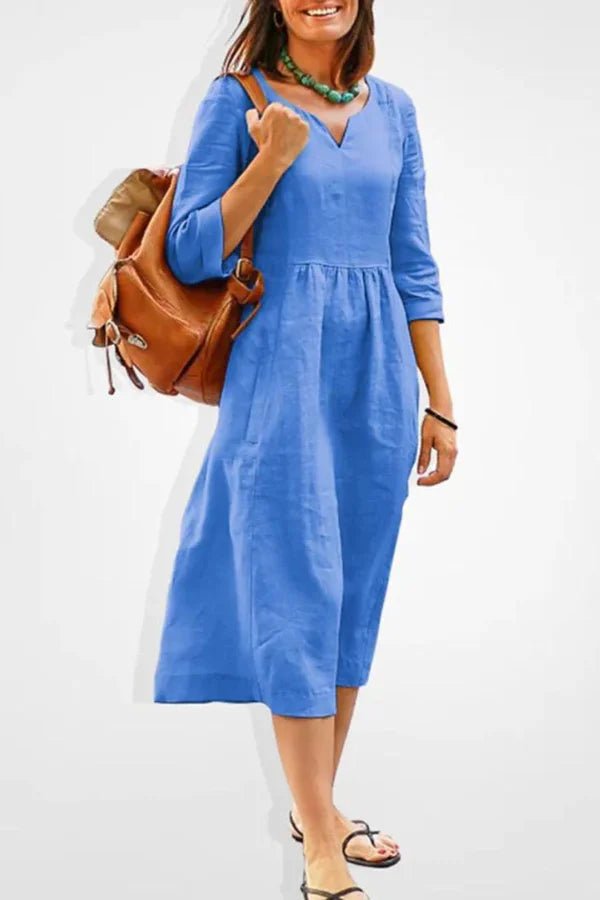 Robe longue fluide à manches longues élégantes. 0