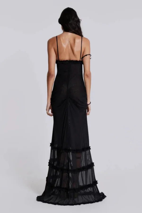Robe longue fluide avec silhouette ample et volants délicats. 7