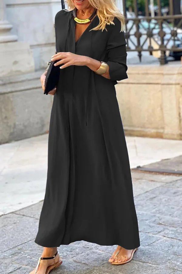 Robe longue fluide, silhouette ample élégante. 0