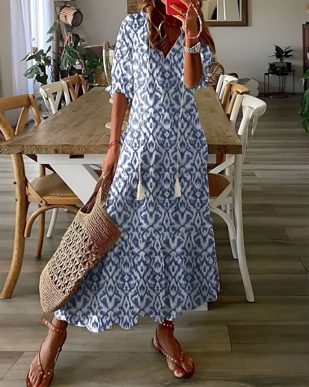 Robe longue fluide au style bohème chic. 0