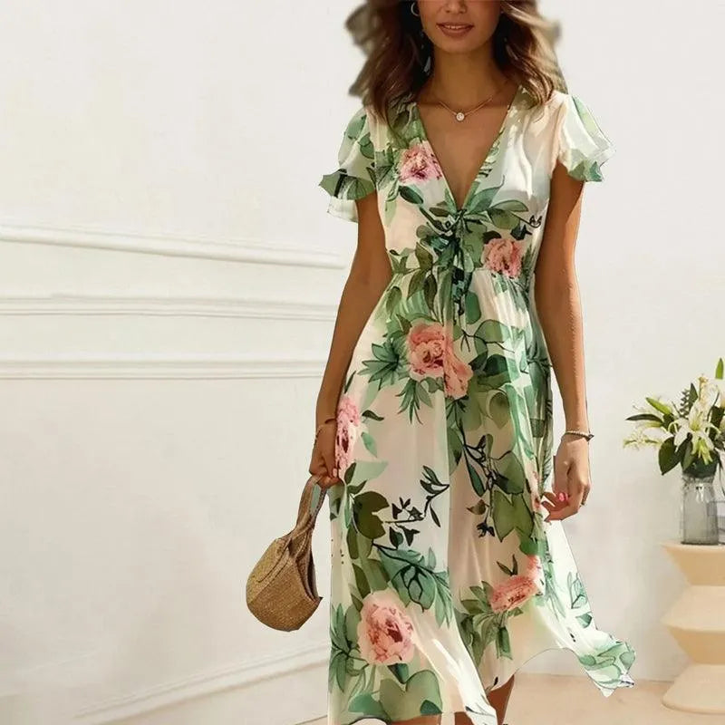 Robe midi élégante avec décolleté en V et jupe trapèze fluide. - 2