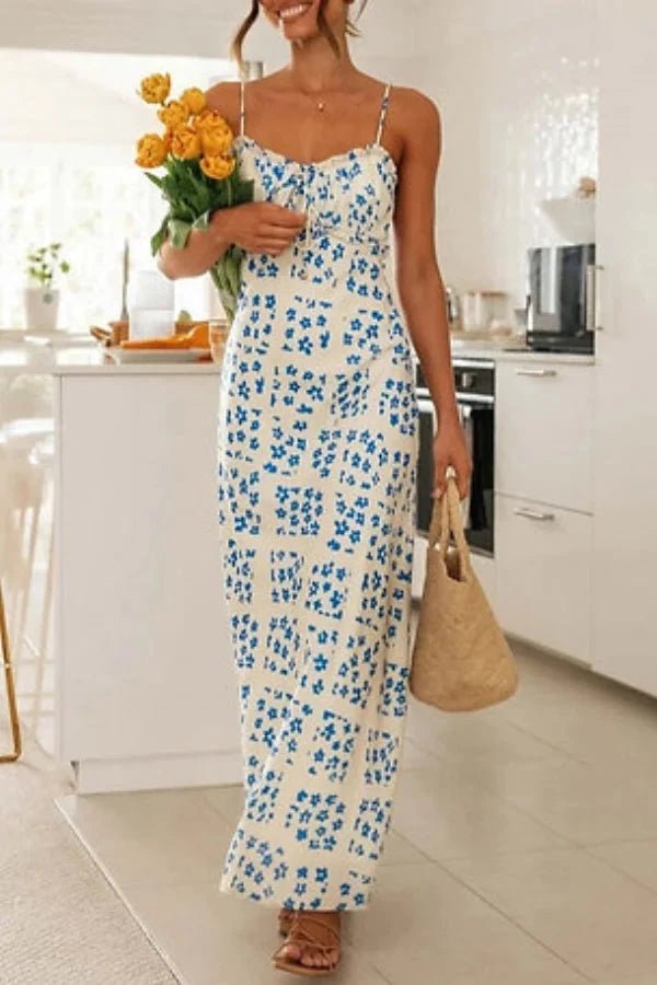 Robe midi élégante, silhouette droite avec volants et motifs floraux. 3