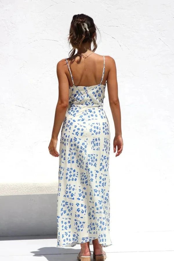 Robe midi élégante, silhouette droite avec volants et motifs floraux. 6