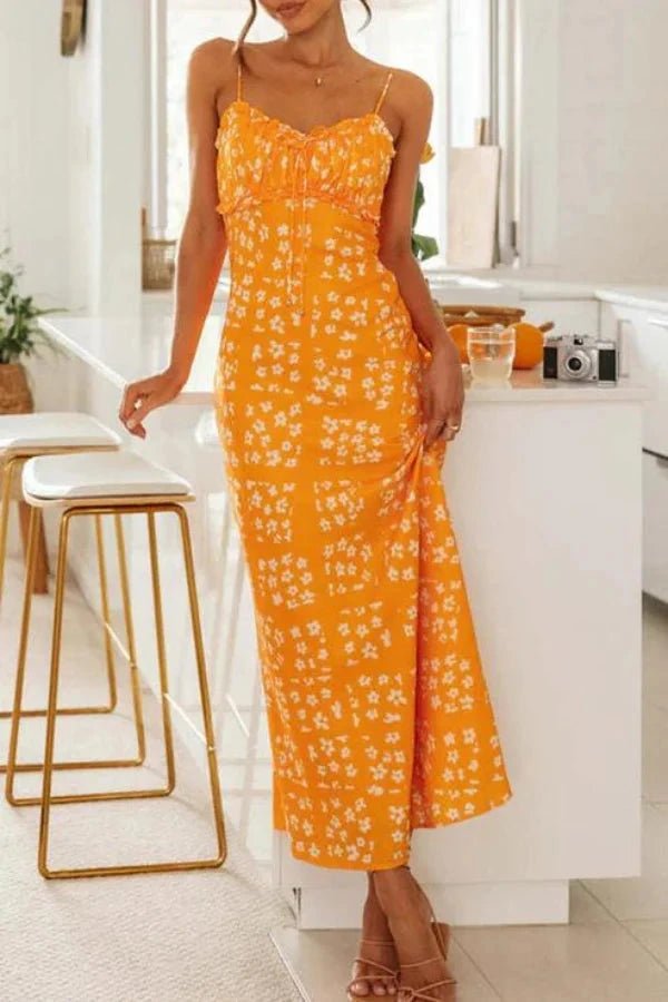 Robe midi élégante, silhouette droite avec volants et motifs floraux. 8