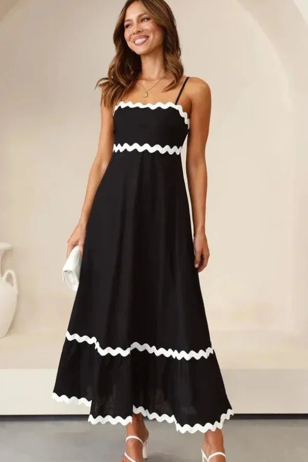 Robe midi évasée avec des détails festonnés élégants. - 1