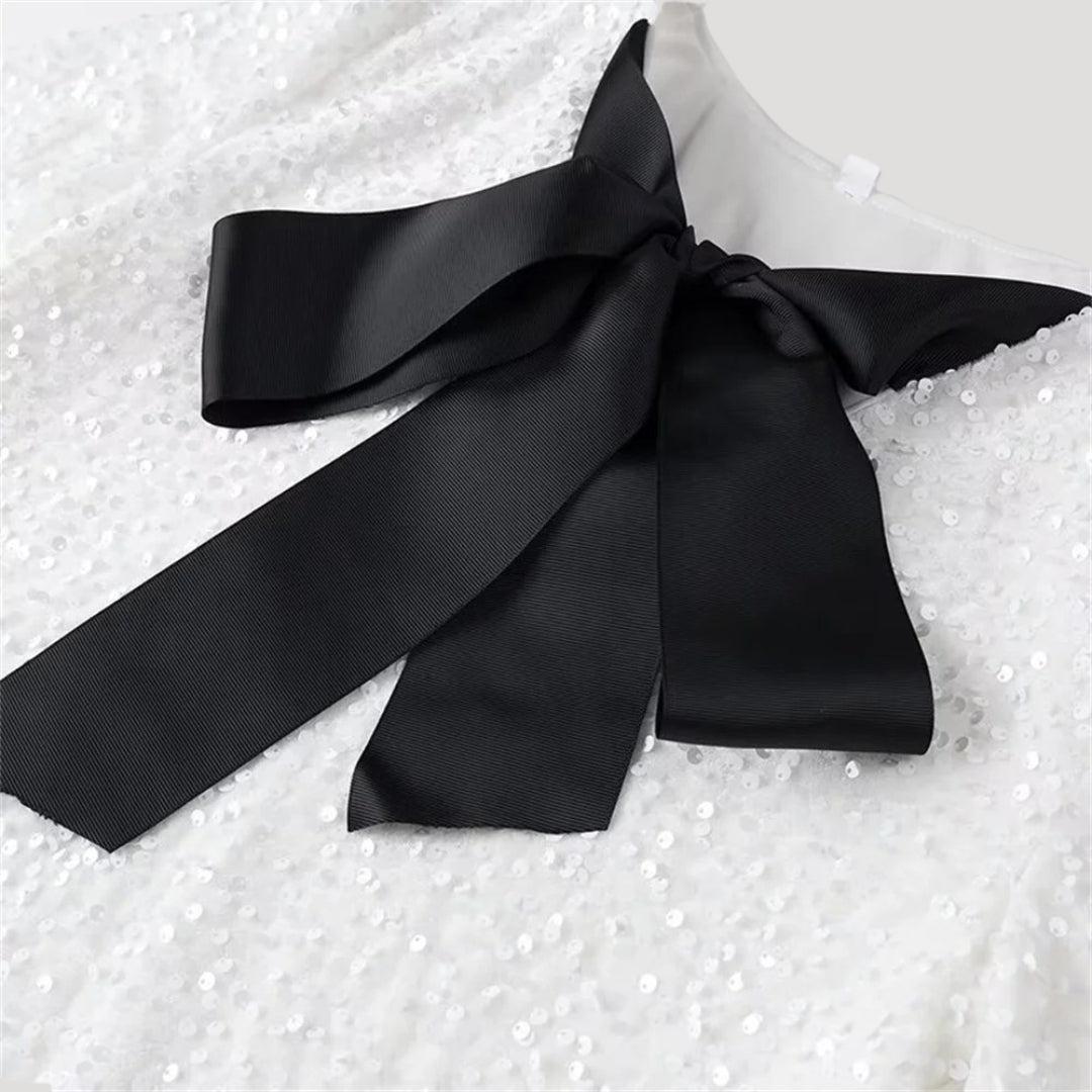 Robe portefeuille à nœud élégant, silhouette flatteuse et style sophistiqué. - 7