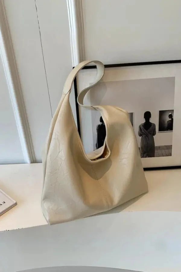 Sac à main élégant pour femme avec design moderne et poche pratique. - 1