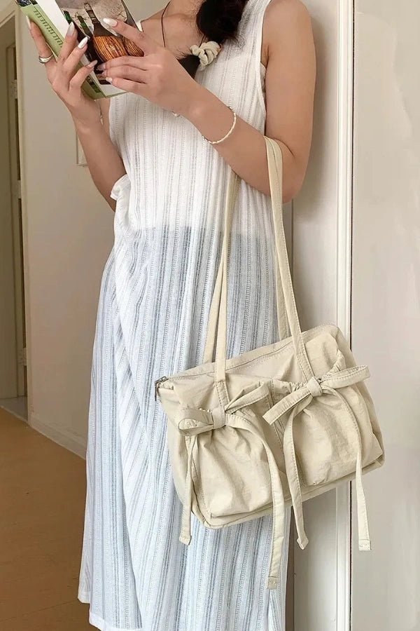Sac à main noué, élégant et spacieux pour femme. - 8
