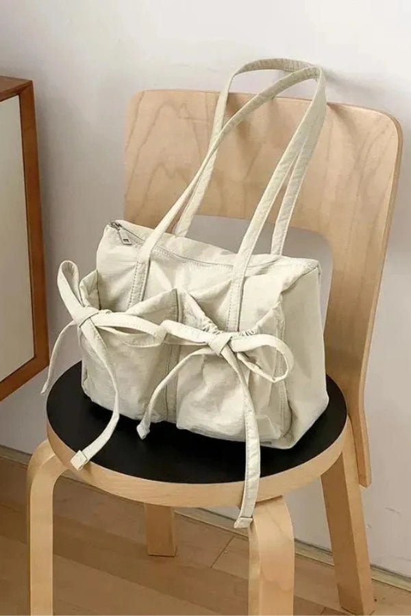 Sac à main noué, élégant et spacieux pour femme. - 9