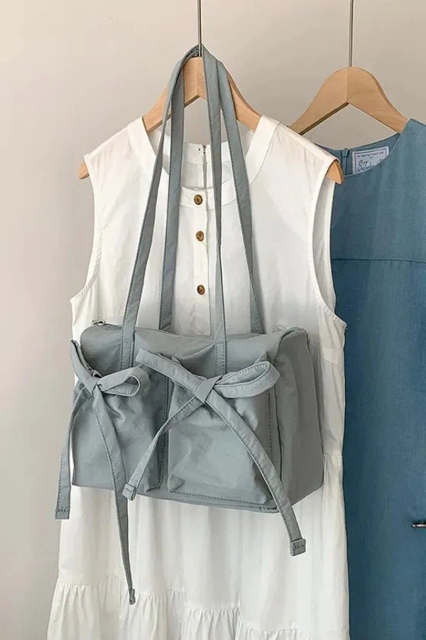 Sac à main noué, élégant et spacieux pour femme. - 10